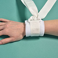 ATTACHE-MEMBRES RENFORCES EN NON-TISSE MEDICAL A USAGE UNIQUE